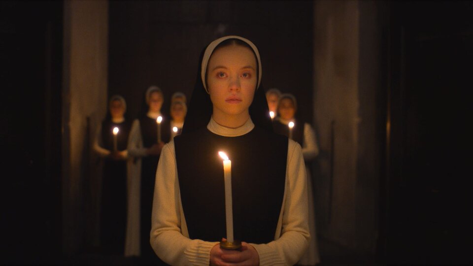 A nun in darkness in “Immaculata”, a movie by Sydney Sweeney