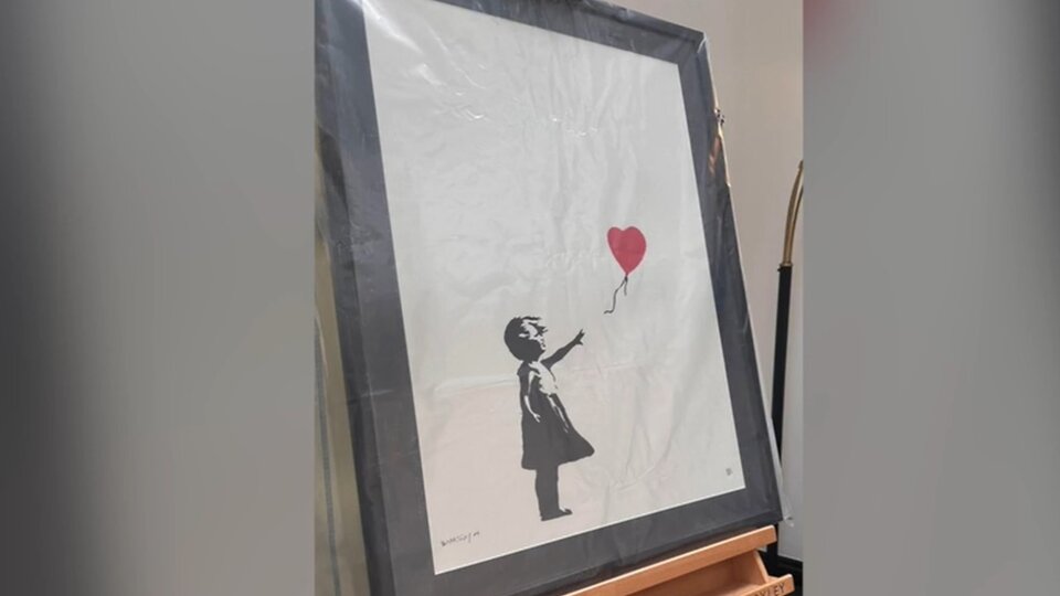 Two men charged with stealing Banksy artwork in London | The “Balloon Girl” is valued at 5,000