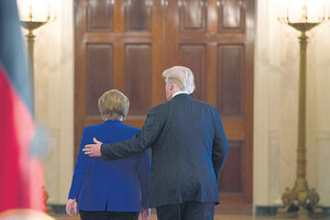 Visita relámpago de Merkel (Fuente: AFP)