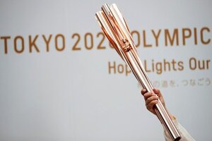 La antorcha olímpica y las muchedumbres (Fuente: AFP)