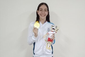 Malena Santillán, con 14 años, le dio tres medallas a la natación argentina. (Fuente: Prensa COA)