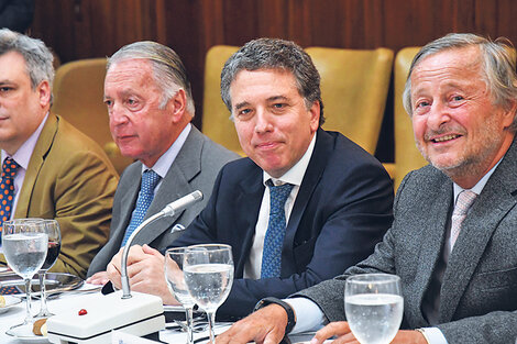 Nicolás Dujovne junto a Cristiano Rattazzi y Daniel Funes de Rioja. (Fuente: Télam)