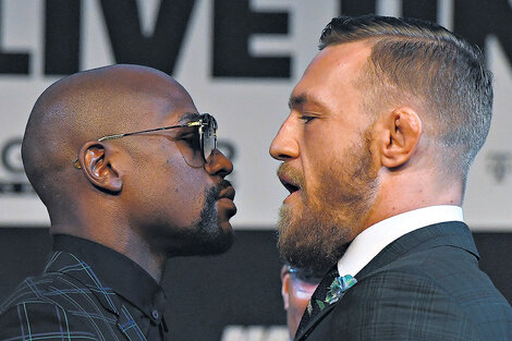 Mayweather y McGregor antes del combate que se estima recaudará 700 millones de dólares.