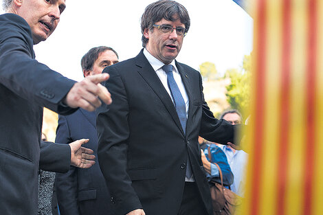 “Que se revierta la represión contra el pueblo y el gobierno de Cataluña” dijo ayer Puigdemont. (Fuente: AFP)