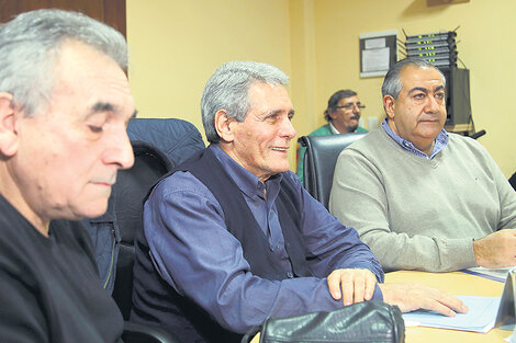 Los triunviros de la CGT Juan Carlos Schmid (portuarios), Carlos Acuña (garajes) y Héctor Daer (sanidad).