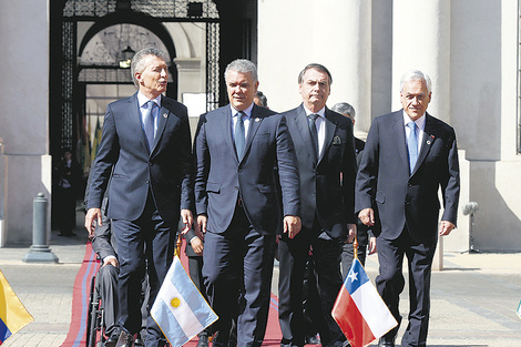 Macri, Duque, Bolsonaro y Piñera antes de la firma del documento.