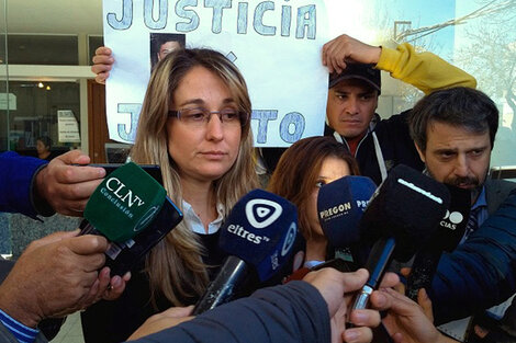 Otro policía detenido