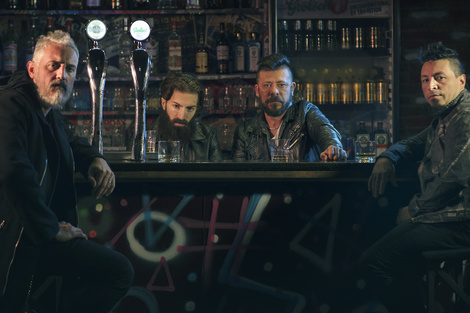 Los integrantes de la banda Traxion Etílica.