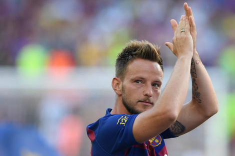 Rakitic, 310 partidos y 16 títulos en el club catalán.