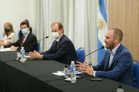 Guzmán junto a De Pedro y Bordet, en la charla en el Centro de Convenciones de Paraná