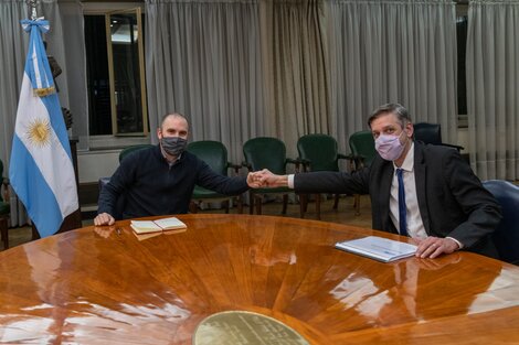 El ministro Guzmán junto a Rafael Ignacio Brigo.