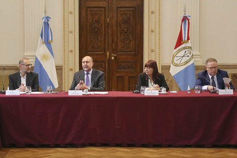 Corach, Perotti, Arenas y Lagna en la reunión.