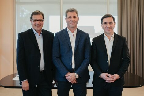 Rubén y Sergio Uñac junto a Cristian Andino, en un acto de campaña en San Juan.