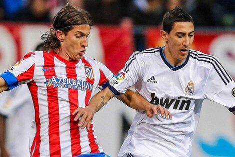 Filipe Luis y Di María en un partido entre Atlético de Madrid y Real Madrid.