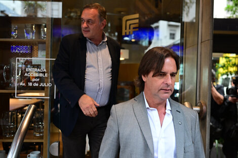 Lacalle Pou; detrás su delfín Delgado.