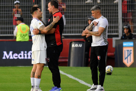 Fabbiani y Russo en un abrazo solidario (Fuente: Fotobaires)