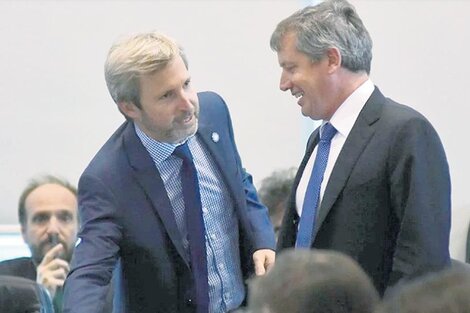 El ministro del Interior, Rogelio Frigerio, y el presidente de la Cámara de Diputados, Emilio Monzó.