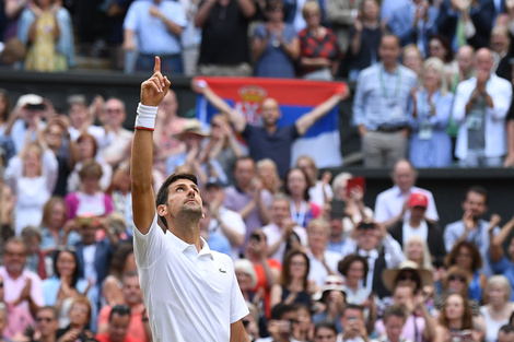 Djokovic festeja tras el maratónico partido de cinco horas.