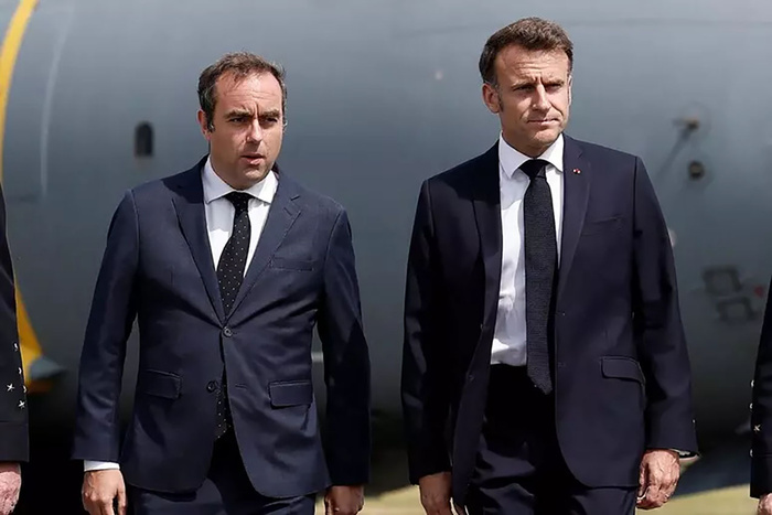 973877-macron-afp