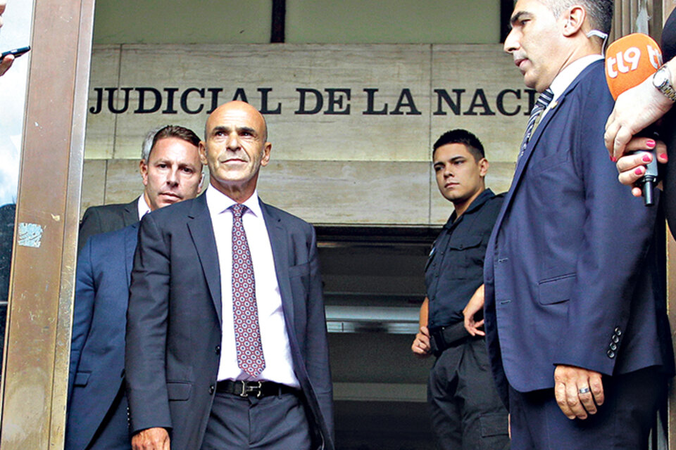 Gustavo Arribas, jefe de la AFI, investigado por la Justicia. Mariano Federici, titular de la UIF. (Fuente: DyN)