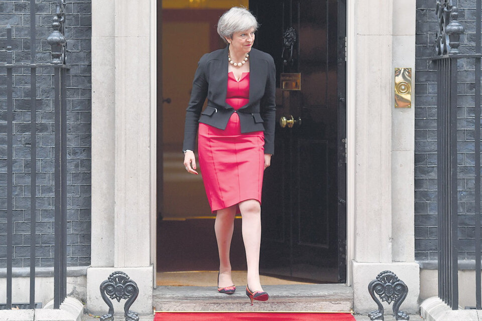 “Tengo un trabajo que hacer en los próximos años y estoy totalmente concentrada en hacerlo”, dijo May. (Fuente: AFP)