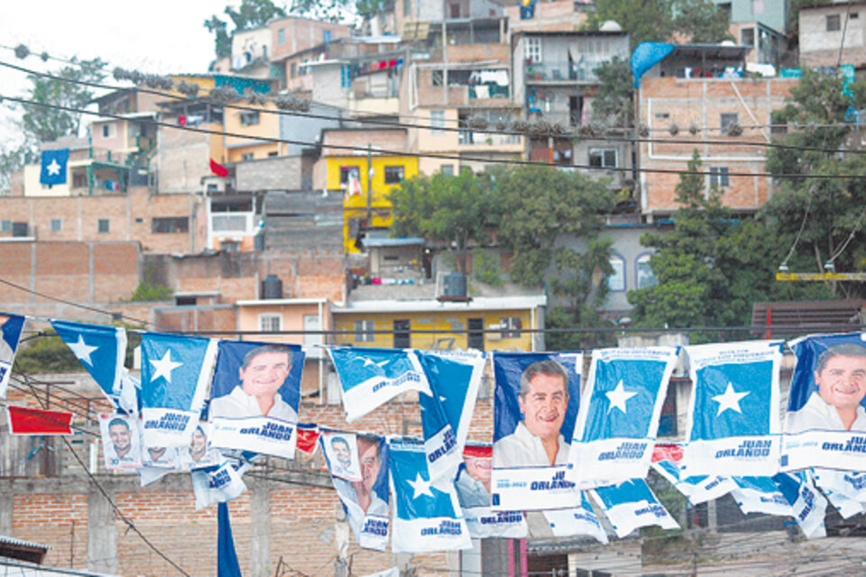 Propaganda electoral de Hernández y del PN en Tegucigalpa. (Fuente: AFP)