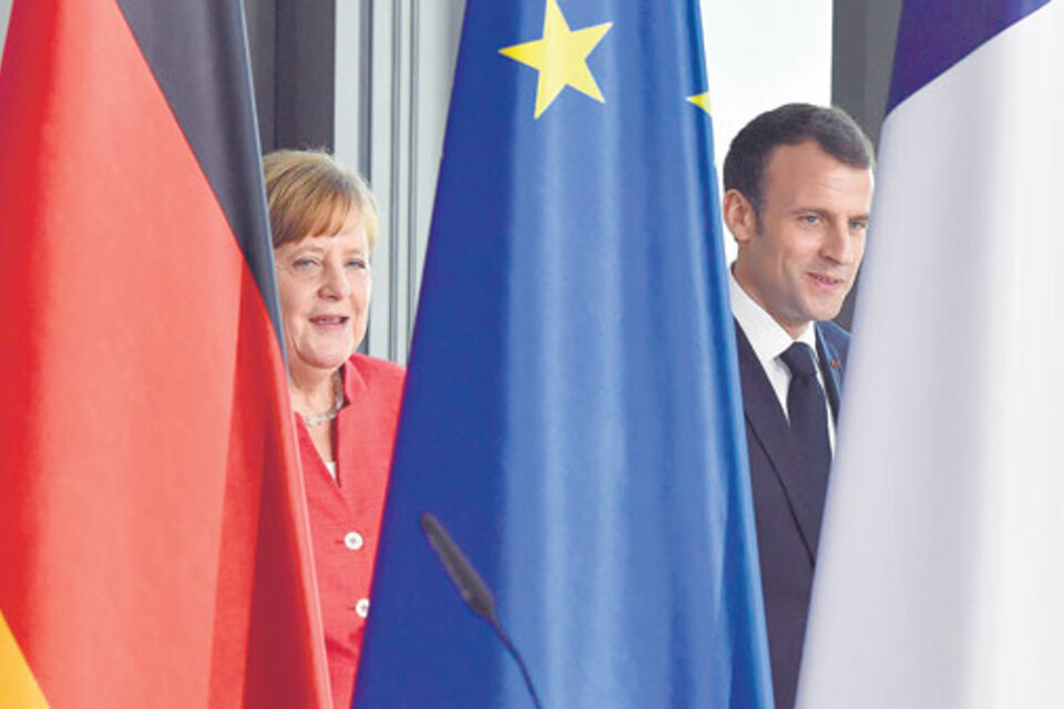 Merkel y Macron reafirmaron ayer la voluntad de superar sus diferencias. (Fuente: AFP)