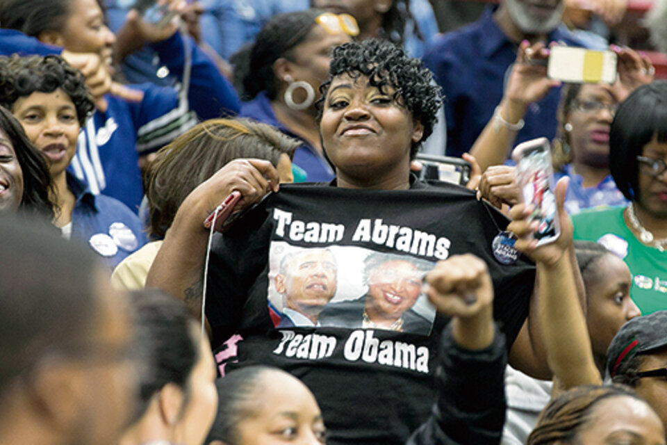 Simpatizantes de Obama durante un acto de la campaña para gobernadora de Stacey Abrams. (Fuente: AFP)