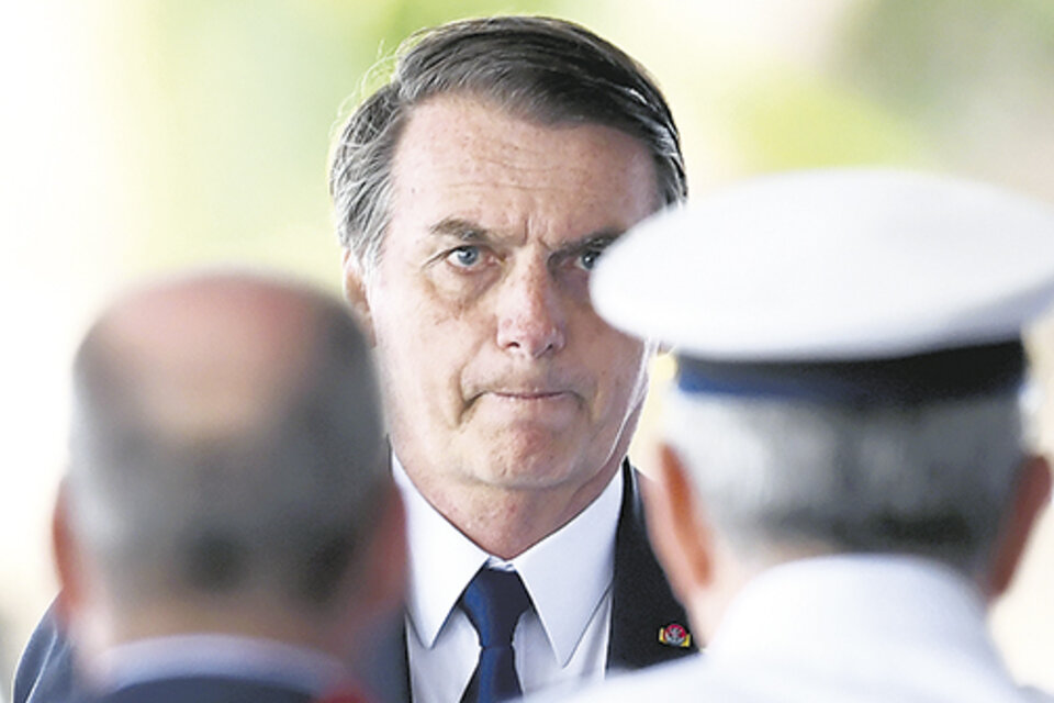 El presidente Jair Bolsonaro recibirá hoy a su par argentino, Mauricio Macri, en el Palacio de Planalto. (Fuente: AFP)