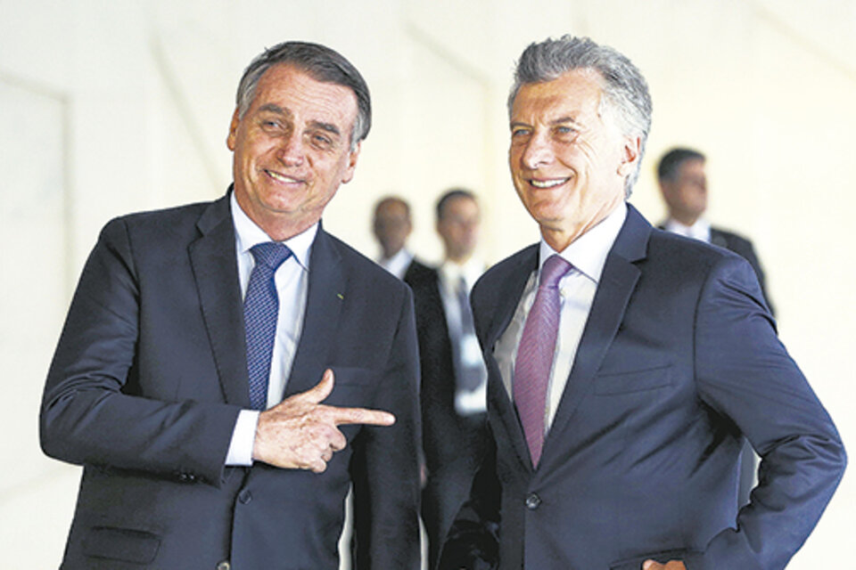 Bolsonaro, conocido por su reivindicación de la dictadura, se ocupó de elogiar la política de seguridad de Macri. (Fuente: AFP)