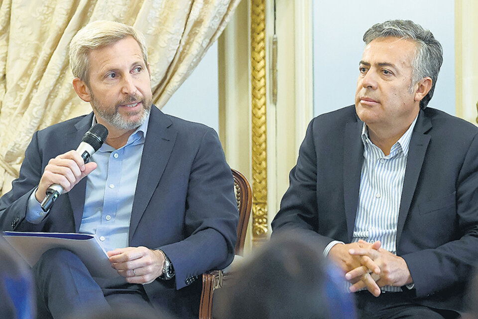 El ministro del Interior, Rogelio Frigerio, y el titular de la UCR y gobernador Alfredo Cornejo.