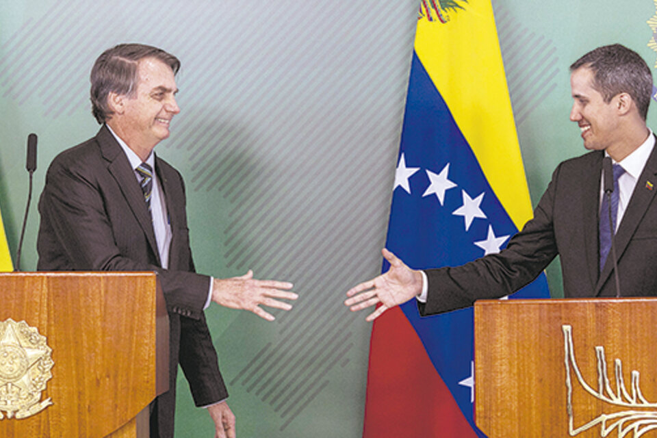El mandatario Jair Bolsonaro dio su respaldo a Juan Guaidó, quien hoy viaja a Paraguay. (Fuente: AFP)