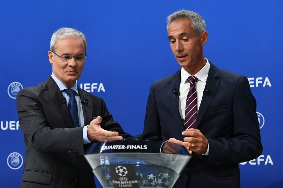 El italiano Giorgio Marchetti y el portugués Paulo Souza, durante el sorteo por videoconferencia. (Fuente: AFP)