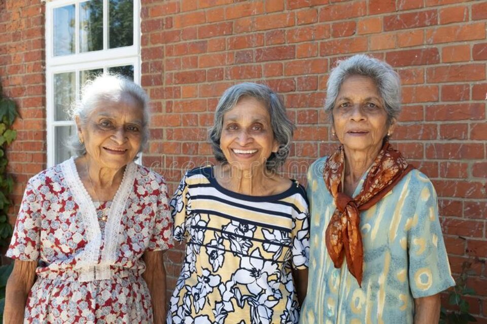 Tres hermanas indias posando para la cámara en Londres