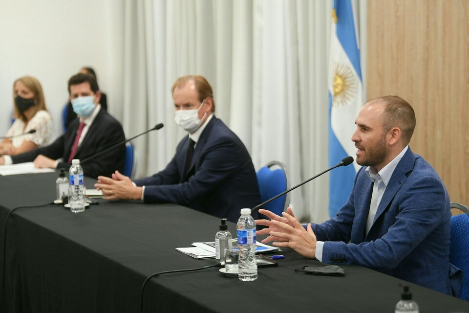 Guzmán junto a De Pedro y Bordet, en la charla en el Centro de Convenciones de Paraná