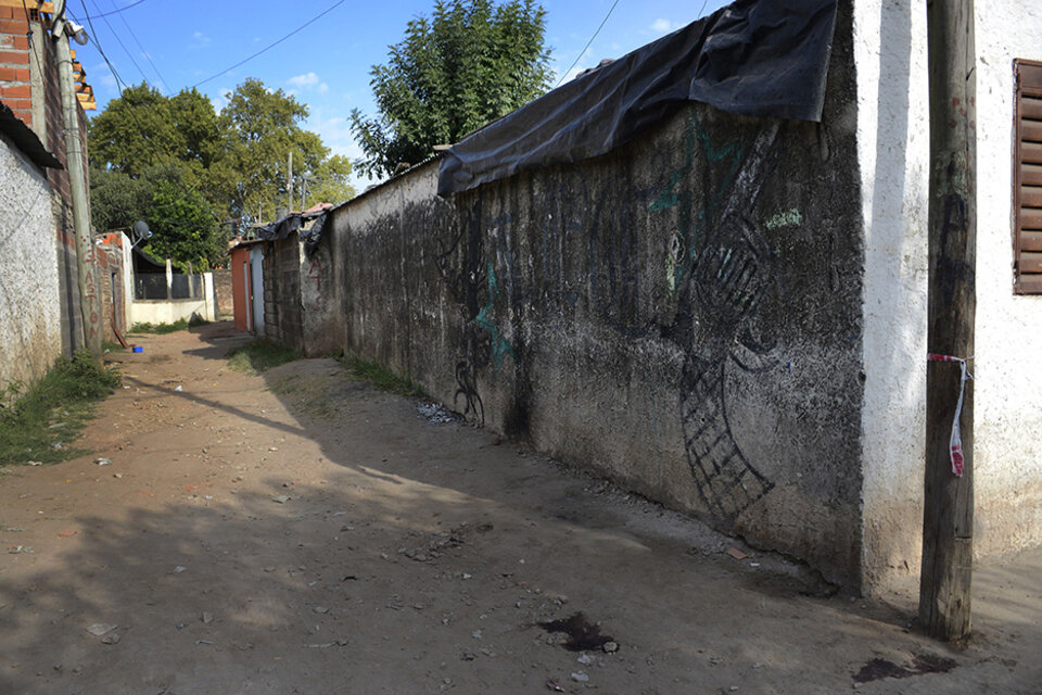 El ingreso al pasillo de Cerrillos al 3700, donde ocurrieron los crímenes (Fuente: Sebastián Granata)