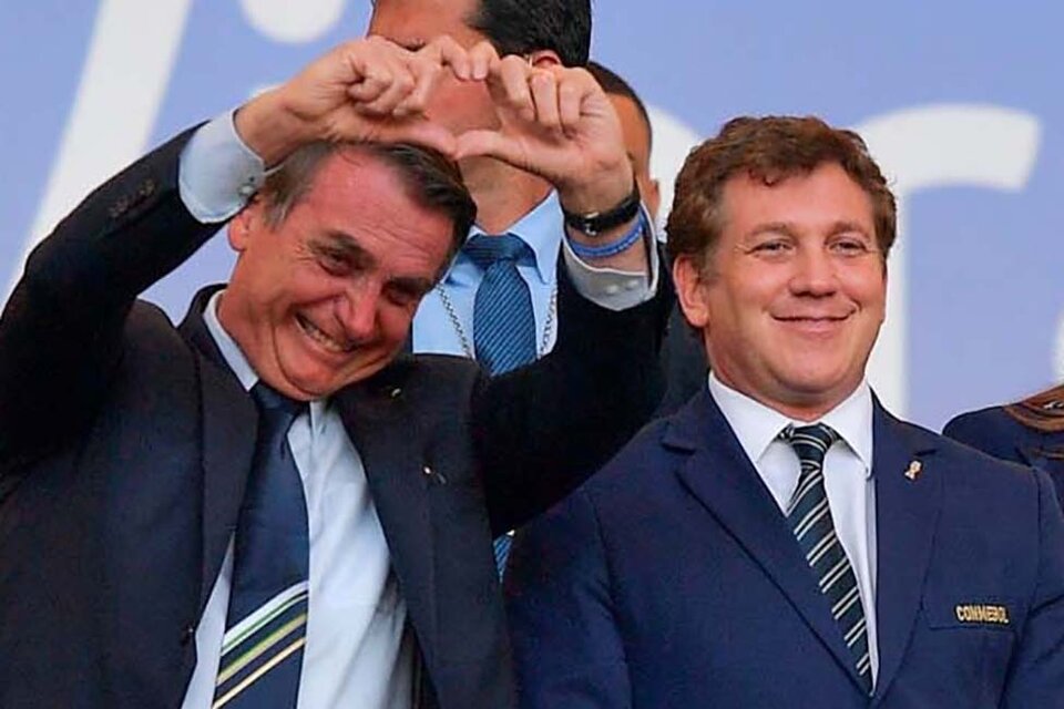 El presidente de Brasil junto al responsable de la Conmebol (Fuente: AFP)
