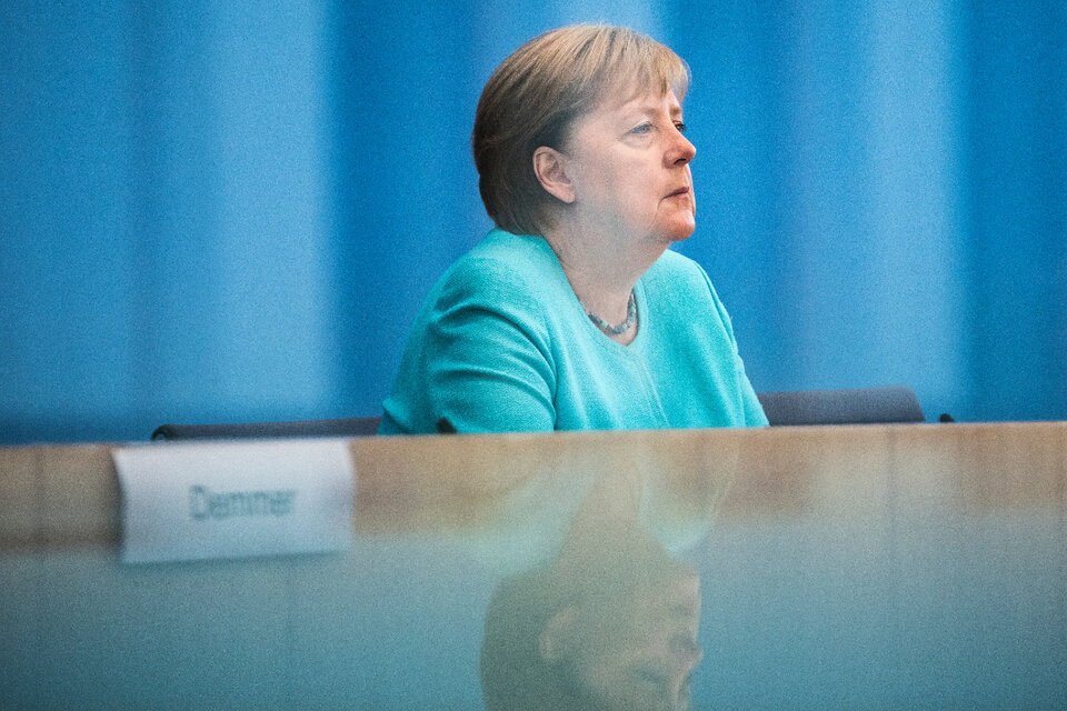 Merkel insistió en la importancia de la vacuna para enfrentar la ola de covid. (Fuente: AFP)