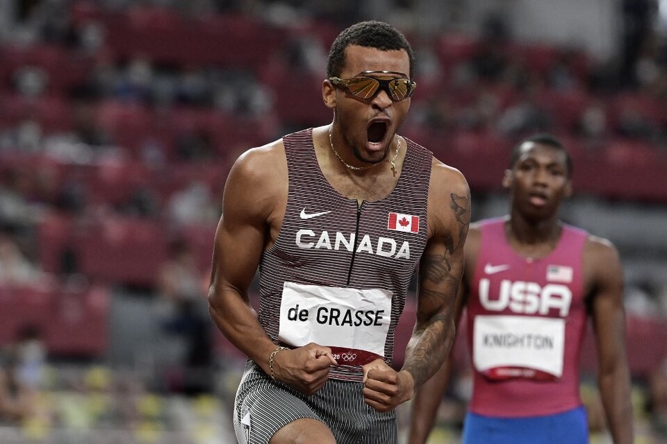 El canadiense de Grasse festeja su triunfo. Detrás, el joven Knighton (Fuente: AFP)