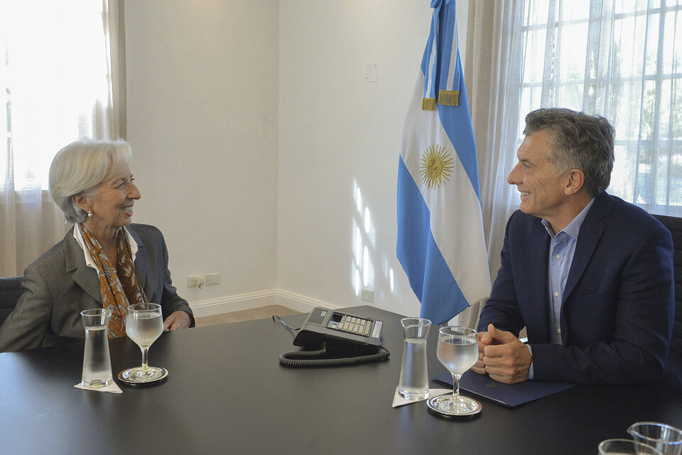 La ex la titular del FMI, Christine Lagarde, junto al ex Presidente, Mauricio Macri.  (Fuente: AFP)