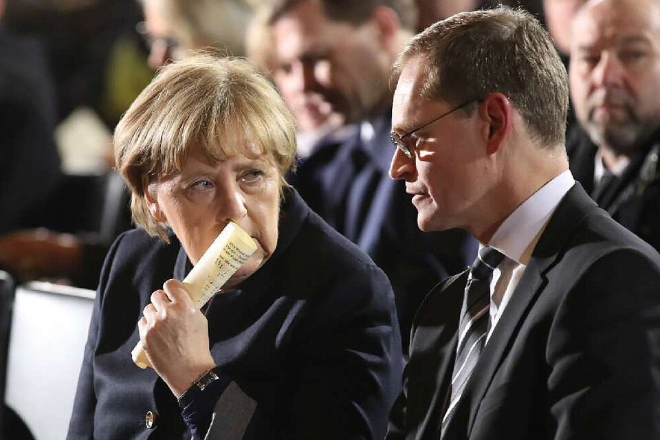 Merkel y Michael Meuller, alcalde de Berlín (Fuente: AFP)