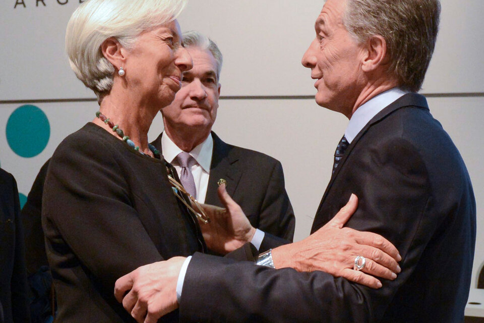 La extitular del FMI, Christine Lagarde, y el expresidente argentino Mauricio Macri. (Fuente: AFP)