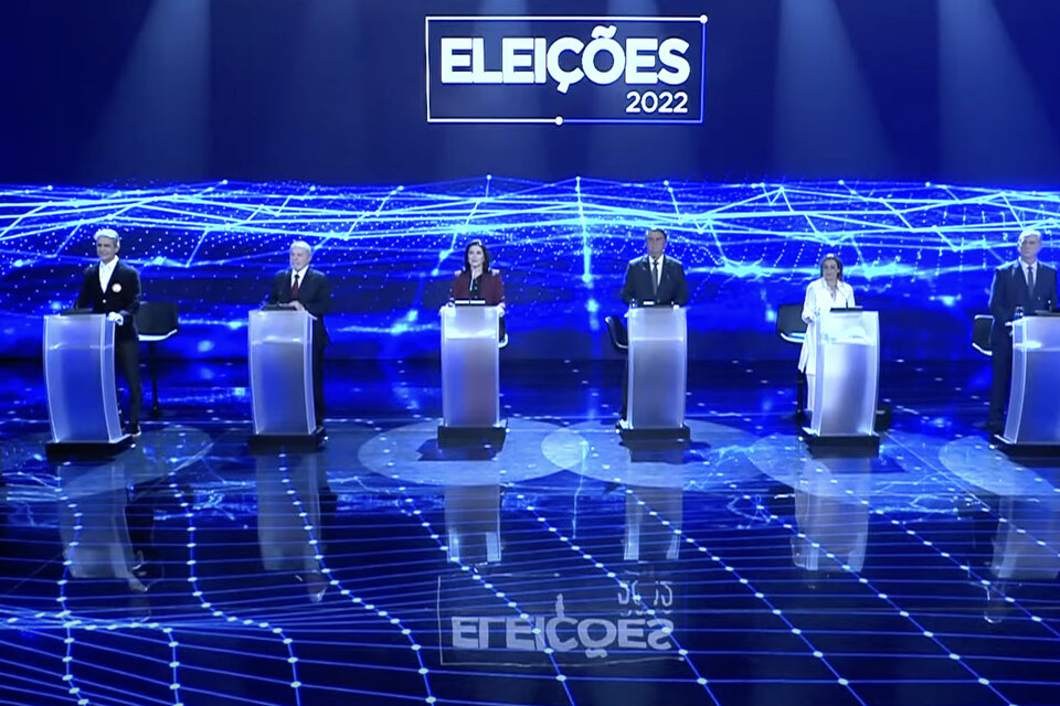 Candidatos presidenciales durante el primer debate / captura 