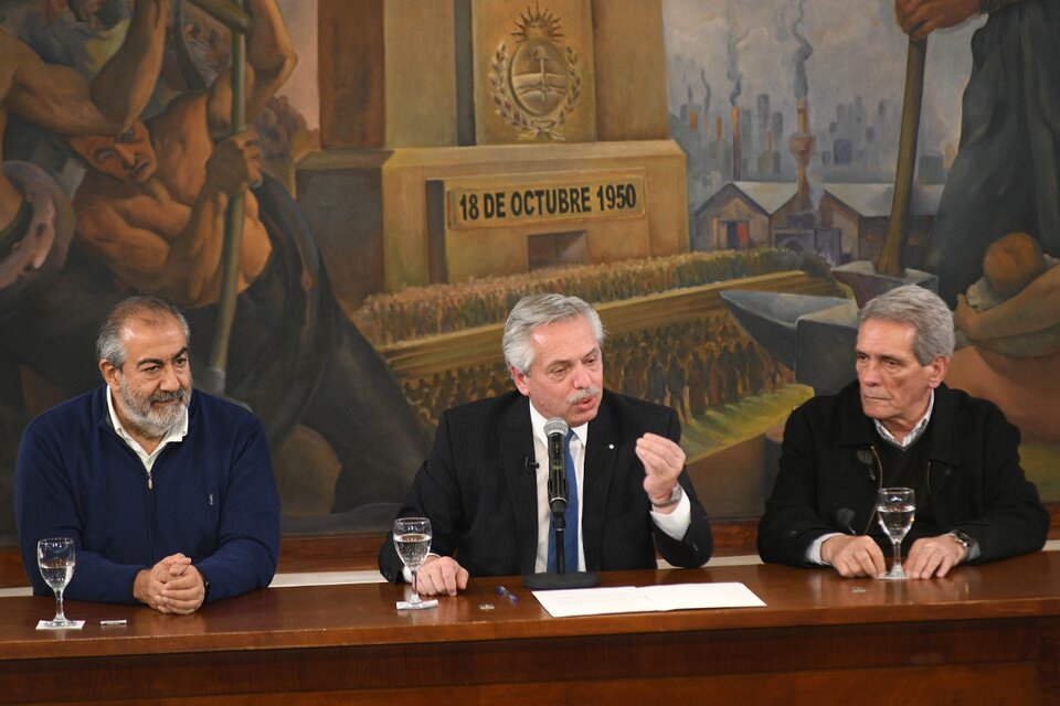 Los tríunviros Héctor Daer y Carlos Acuña entre los que participaron de la cena con el Presidente Fernández.