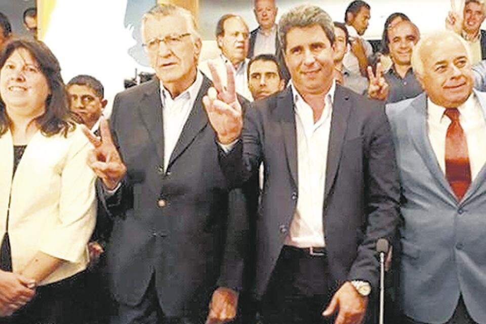 José Luis Gioja y Sergio Uñac, en un acto de 2019.