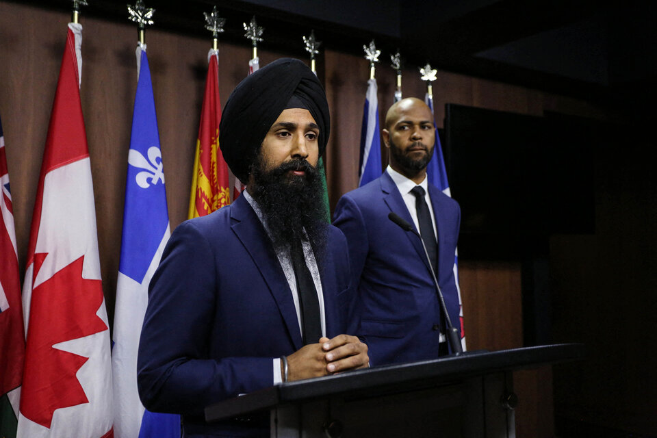 El presidente de la Organización Mundial Sij de Canadá, Mukhbir Singh, y el director ejecutivo del Consejo Nacional de Musulmanes Canadienses, Stephen Brown. (Fuente: AFP)