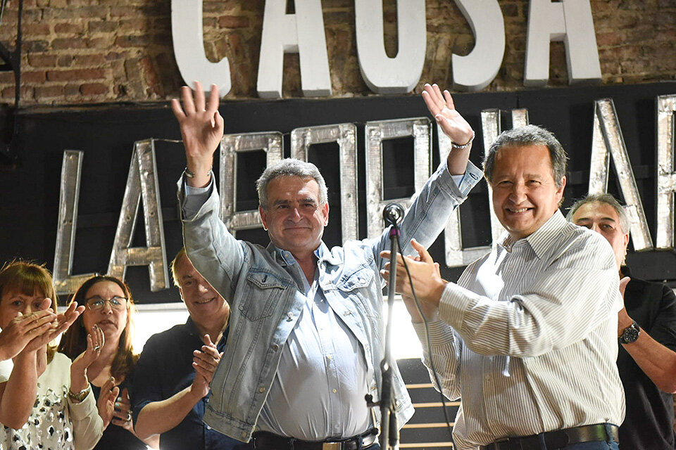 Rossi con el diputado Del Frade.