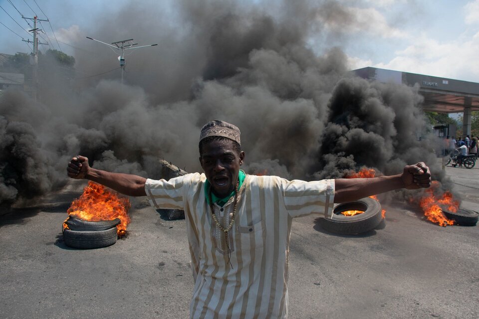 Protesta en Puerto Príncipe tras la renuncia de Henry. (Fuente: AFP)