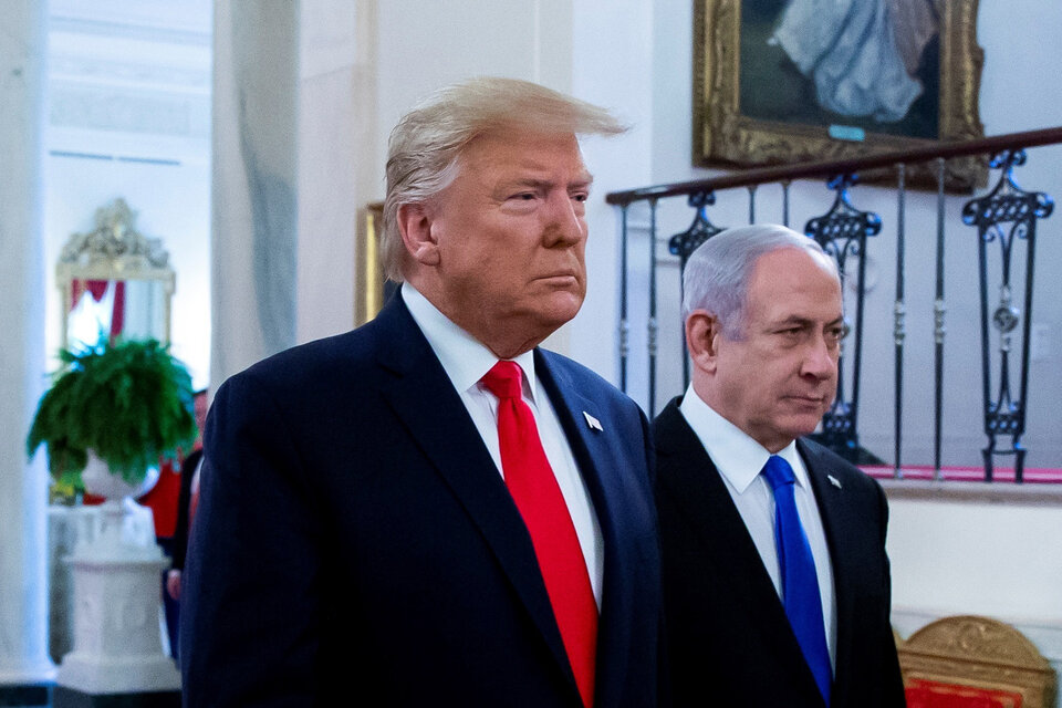 Trump, junto a Netayahu, durante la presentación  de su plan de paz. (Fuente: AFP)