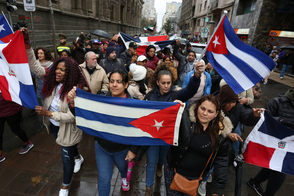 Los manifestantes se reunieron para reclamar contra las duras condiciones que deben enfrentar los migrantes. (Fuente: AFP)